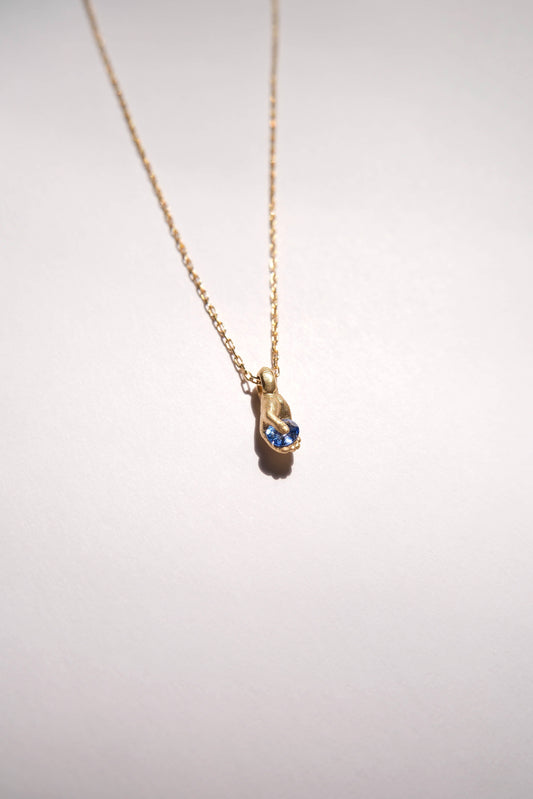Fraser Hamilton Gold Hand Pendant with Cornflower Blue Oval Cut Sapphire