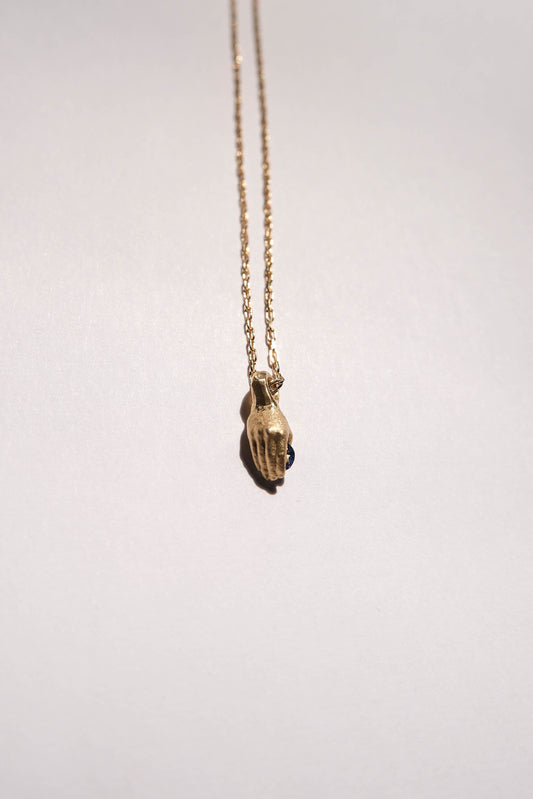 Fraser Hamilton Gold Hand Pendant with Cornflower Blue Oval Cut Sapphire